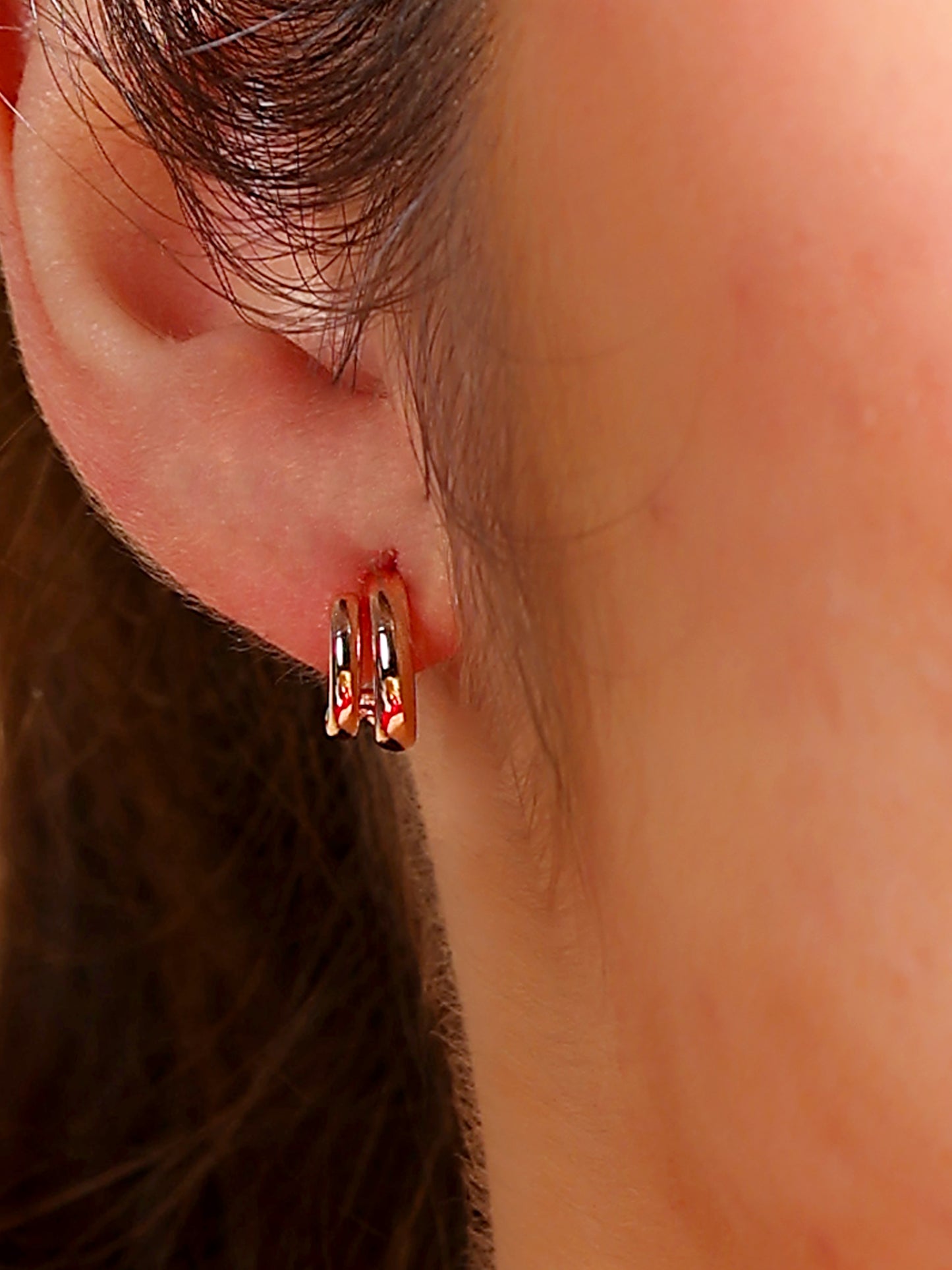 Twisted Rose Gold Mini Hoops